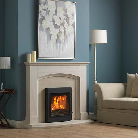 wood burning stove with marble surround